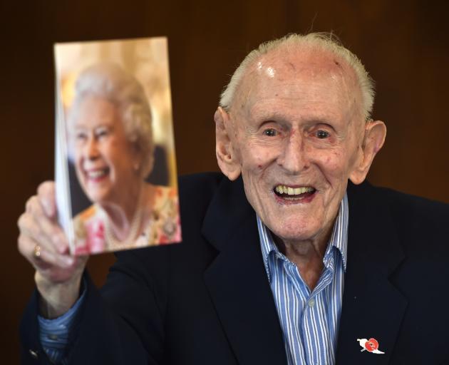 Mosgiel resident Gerald Huntley with a birthday card from the Queen. PHOTO: PETER MCINTOSH
