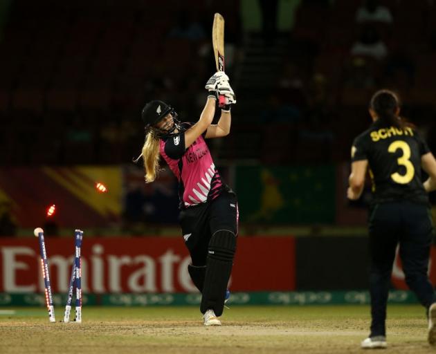 Hannah Rowe gets out to Megan Schutt during the White Ferns loss to Australia yesterday. Photo:...