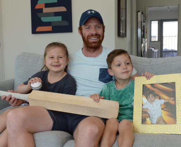 Veteran Green Island wicketkeeper-batsman Anthony Harris celebrates his long career with daughter...