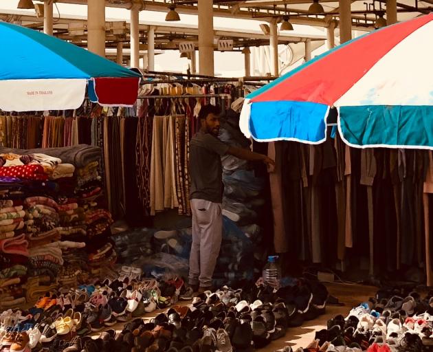 A shoe seller at a souk in Riyadh. Photo: Supplied