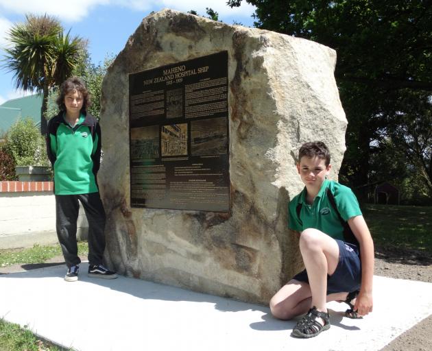 Maheno School pupils Jack Jones (left) and Ben Hamilton (both 12) at the Maheno cenotaph where a...