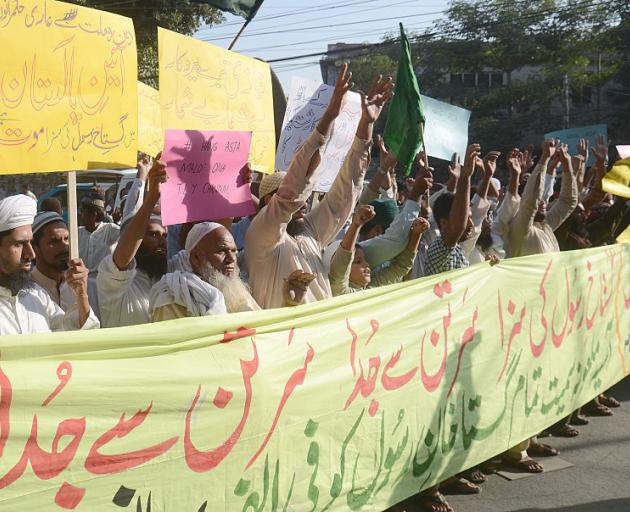Pakistani Sunni Muslims from a religious group protest against Asia Bibi. Photo: Getty Images