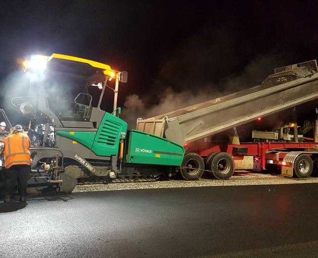 A Downer crew works on resurfacing Queenstown Airport's apron using TonerPave. PHOTO: SUPPLIED