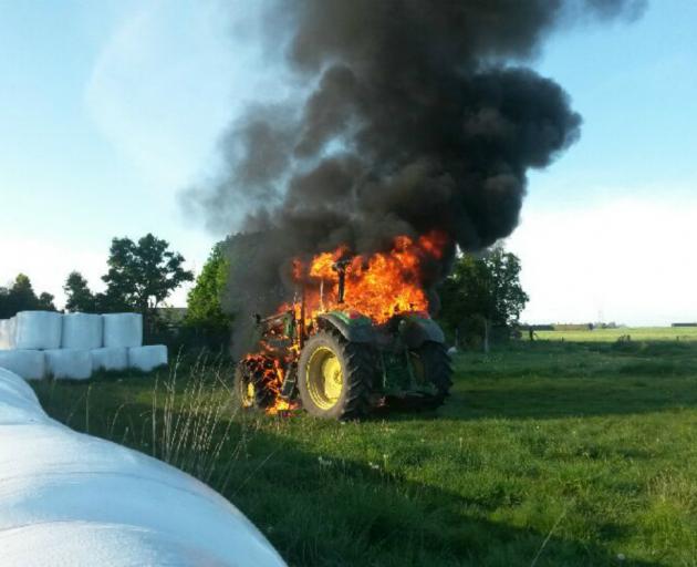 This recent tractor fire in Mid Canterbury, likely caused by birds nesting, completely destroyed the machine, costing tens of thousands of dollars. Photo: Supplied