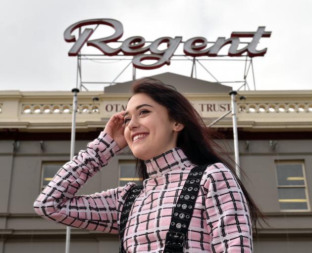 Bachelor of design student Rosette Hailes-Paku (20) models one of her designs outside  the Regent...