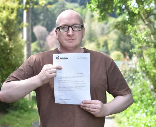 Dunedin homeowner Sam Sharpe says a "threatening" letter from the Dunedin City Council will not...