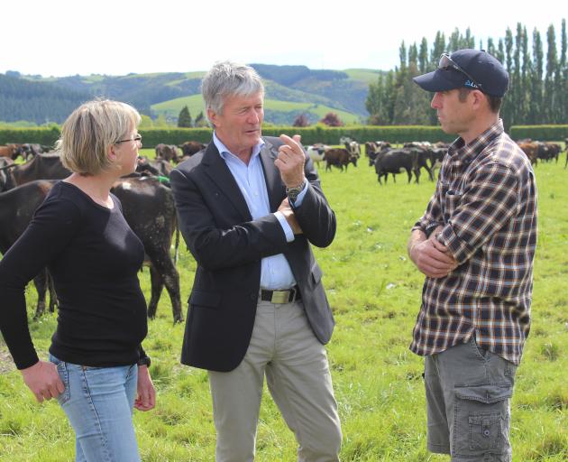 Agriculture and Biosecurity Minister Damien O'Connor (centre) talks with dairy farmers Anne-Marie and Duncan Wells about the future of dairy legislation. The launch of the public consultation of the review of the Dairy Industry Restructuring Act was held 