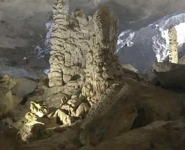 Stalagmites and stalactites in Hang Sung Sot Cave are typical of caverns in the Halong Bay area.
...