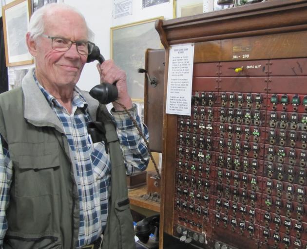 Teviot District Museum committee member Robin Christie displays the old telephone exchange used in the district. Photo: Pam Jones