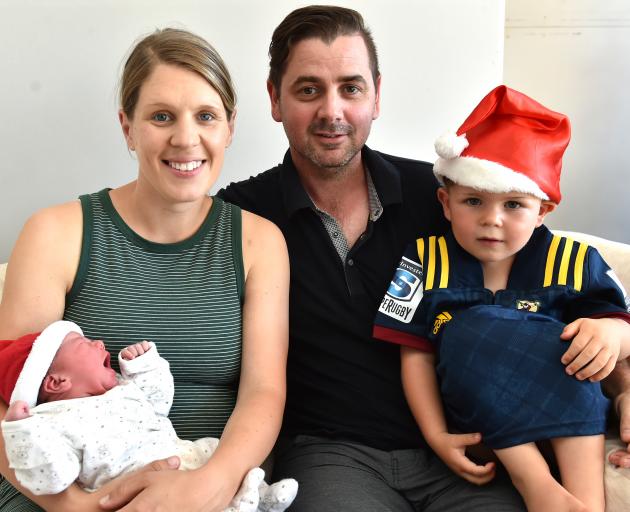 Holding her Christmas baby, Pippa Grace Coppins, is Dunedin mum Mallory Anderson, with her son Benji Anderson (3) and partner Jamie Coppins. Photo: Gregor Richardson