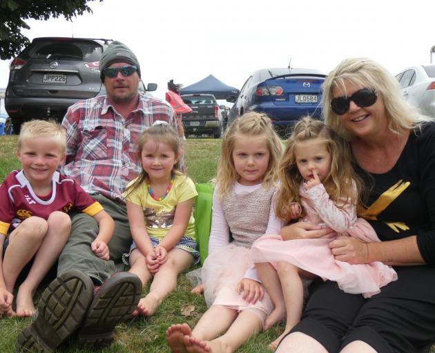 Rochelle Glover, her partner William McMillan and children (from left) Charlie (6) and Sofia (4)...