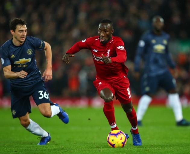 Matteo Darmian (left) of Manchester United and Naby Keita of Liverpool will both play German...