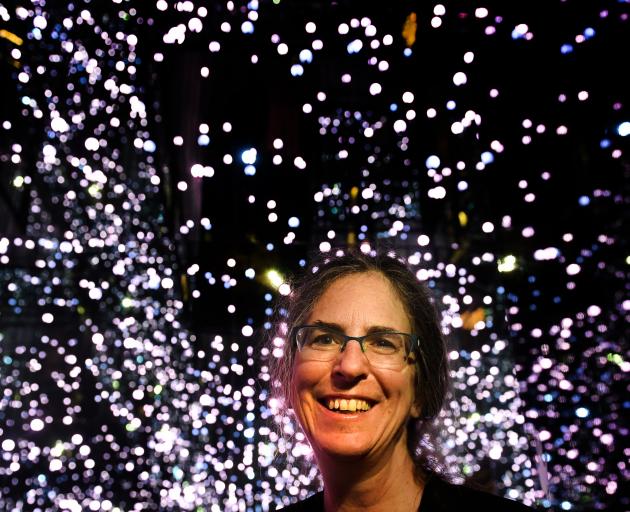 Megan Donahue talks about the mysteries of the universe at Otago Museum yesterday. Photo: Peter McIntosh