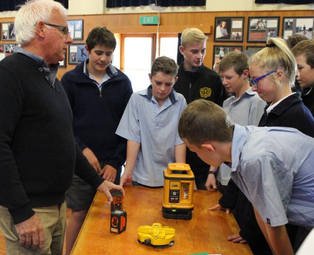 Gore builder Peter Goodger shows year 10  pupils from Gore High School some of the high-tech equipment used in the trade during a Southland Youth Futures employer talk earlier this year. Photos: Supplied