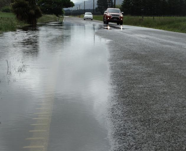 Surface flooding on State Highway 83 near Georgetown, inland from Oamaru, yesterday. PHOTO:...
