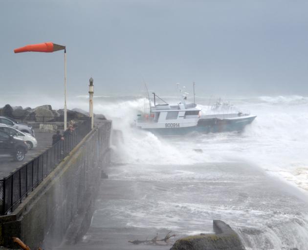 Ocean Odyssey comes close to the rocks as it attempts to enter the Port of Greymouth on February 1. Photo: Greymouth Star