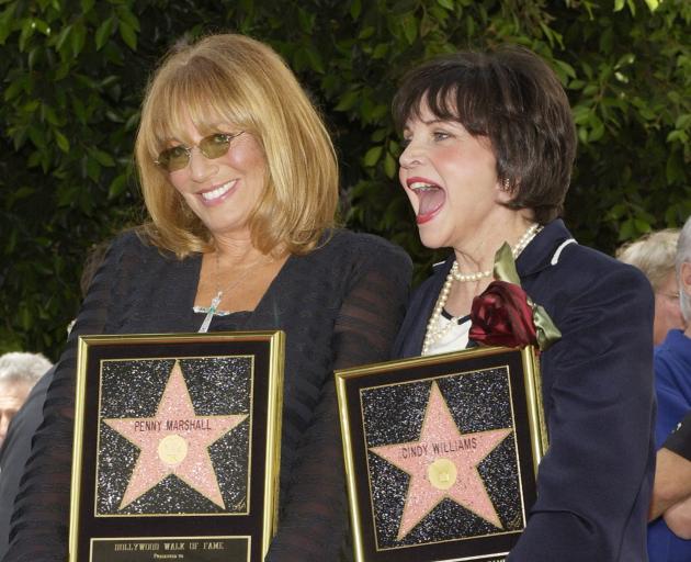 Penny Marshall, and Cindy Williams, who co-starred in the 1970s hit TV series 'Laverne & Shirley', at their Hollwood Walk of Fame ceremony in 2004. Photo: Reuters