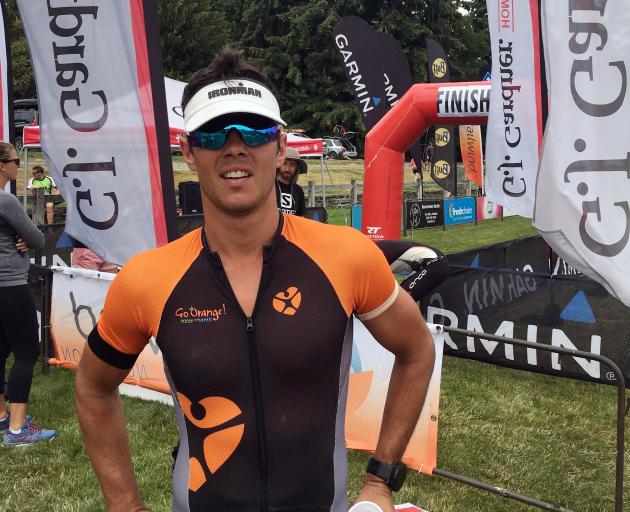 Lake Hayes Triathlon winner Adam Wilson, of Queenstown, at the finish line. PHOTO: JOSHUA WALTON