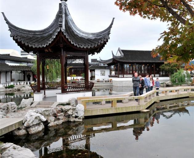 Visitors at the Chinese Garden yesterday.