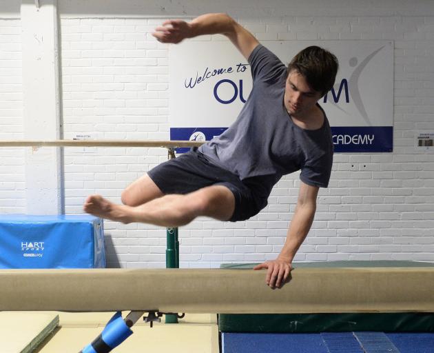 ODT reporter Jono Edwards learns parkour from Pro-Motion head coach Alex Pearson. Photo: Stephen...