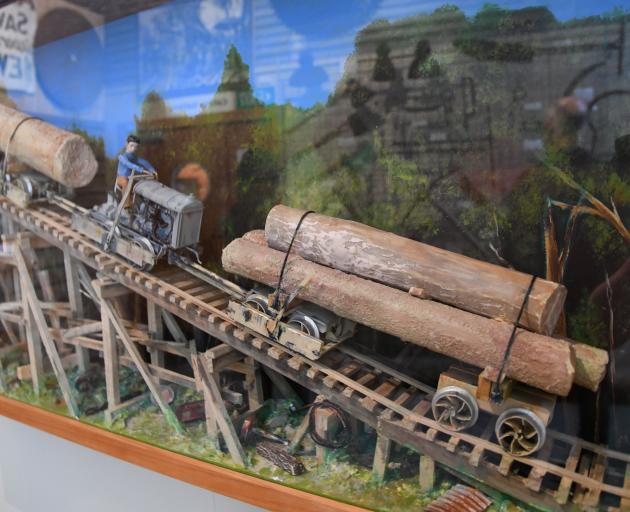 A model shows how logs were transported after felling.