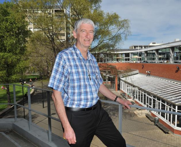 University of Otago chaplain the Rev Greg Hughson looks out over the campus. Photo: ODT