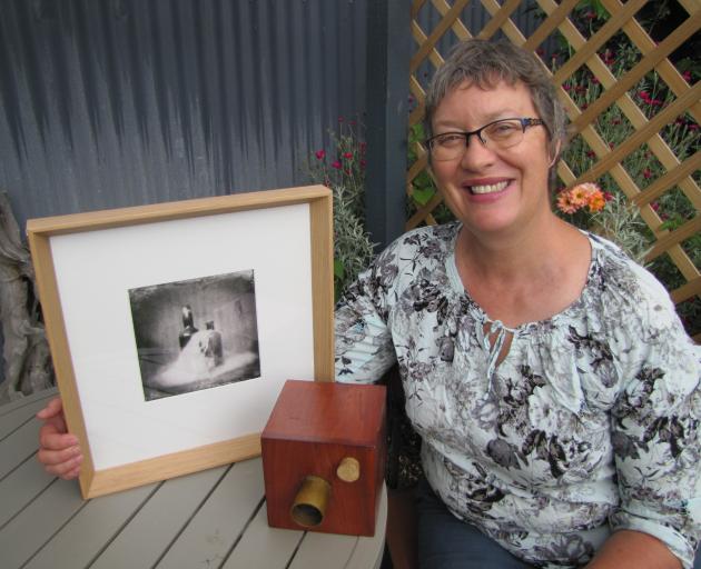 Central Otago artist Annemarie Hope-Cross displays one of the ‘‘Still’’ series of images that received an honourable  mention in an international exhibition. Photo: Pam Jones