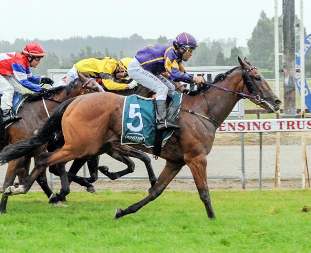 Air Max wins the listed Gore Guineas on Saturday from Dreamtesta (yellow), Weaponry (obscured)...