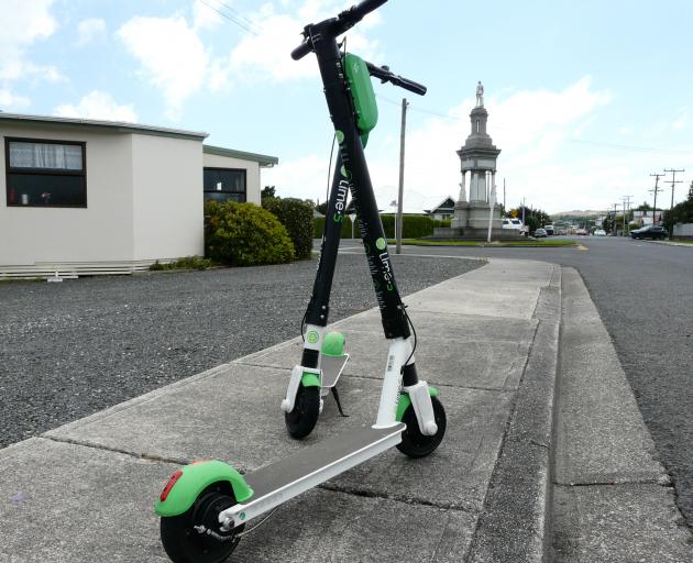 Lime scooters at rest on Renfrew St, Balclutha, near the town’s cenotaph, yesterday afternoon....