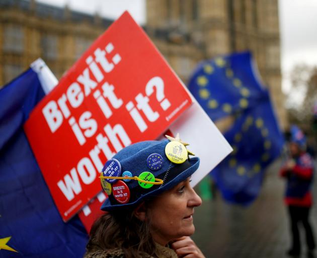 Anti-Brexit demonstrators protest outside the Houses of Parliament in London at the weekend....