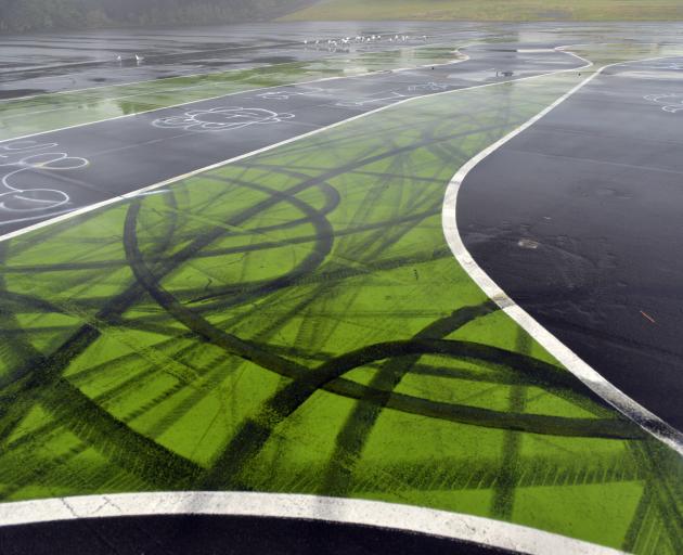 Graffiti and burnout damage cover the Otago Radio Control Car Club race track in Victoria Rd,...