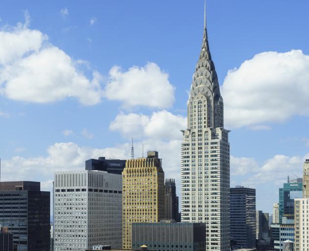 New York's iconic Chrysler Building (right) is to be put up for sale. Photo: Getty Images New York's iconic Chrysler Building (right) is to be put up for sale. Photo: Getty Images