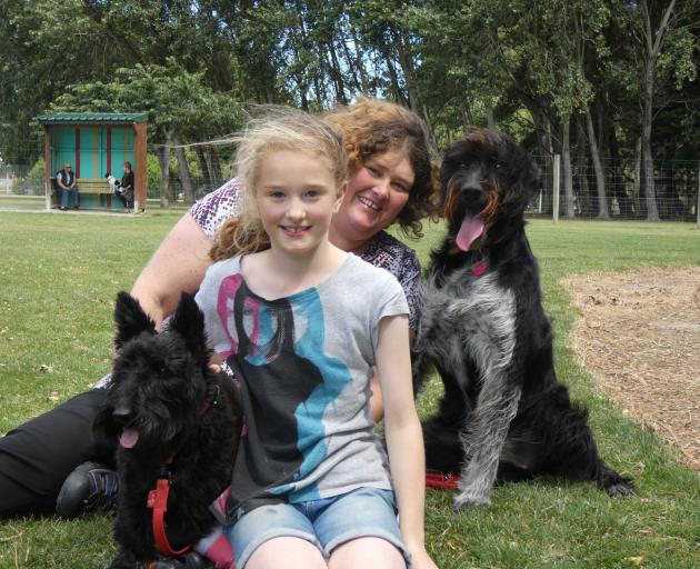 Colleen Wells and daughter Lily (9), of Invercargill,  with their dogs,  Bonnie (left) and Poppy,...