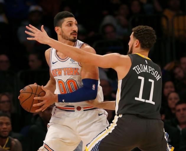 Knicks big man Enes Kanter in action against Golden State Warriors guard Klay Thompson earlier...