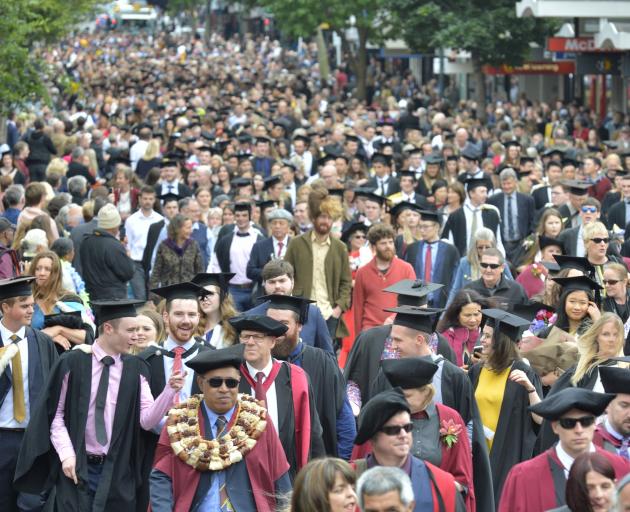 University of Otago graduands march up George St during a graduation parade last year. PHOTO:...