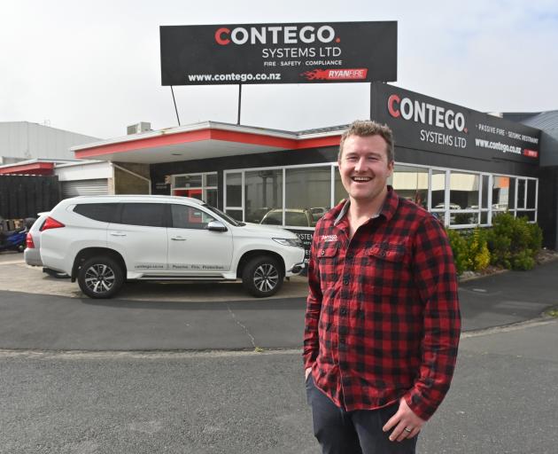 Contego Systems founder Justin McEntyre outside the firm's premises in French St, Dunedin. Photo: Linda Robertson