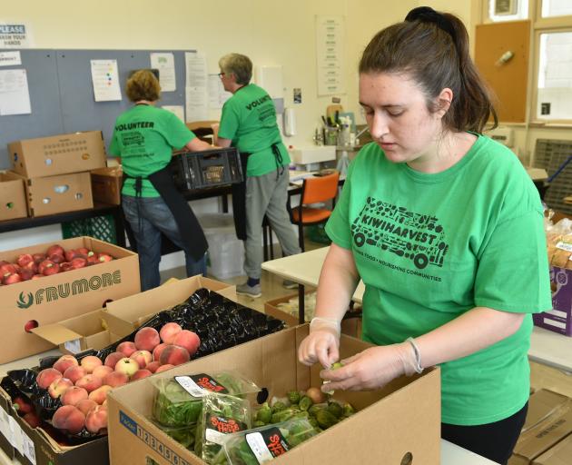 KiwiHarvest volunteer Olivia Eyles sorts through rescued food at the organisation’s Dunedin...