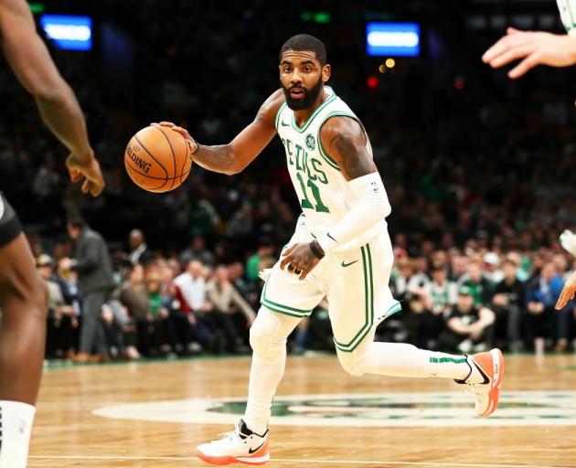 Boston Celtics guard Kyrie Irving during yesterday's match against the Brooklyn Nets. Photo:...