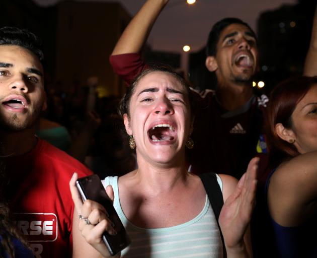 People gather in support of Venezuela's opposition leader Juan Guaido in Lima, Peru. Photo: Reuters