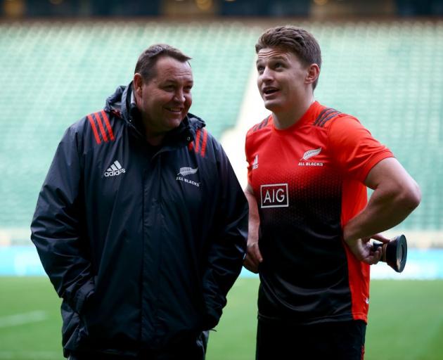 Steve Hansen (left) talks with Beauden Barrett at Twickenham at the end of last year. Photo:...