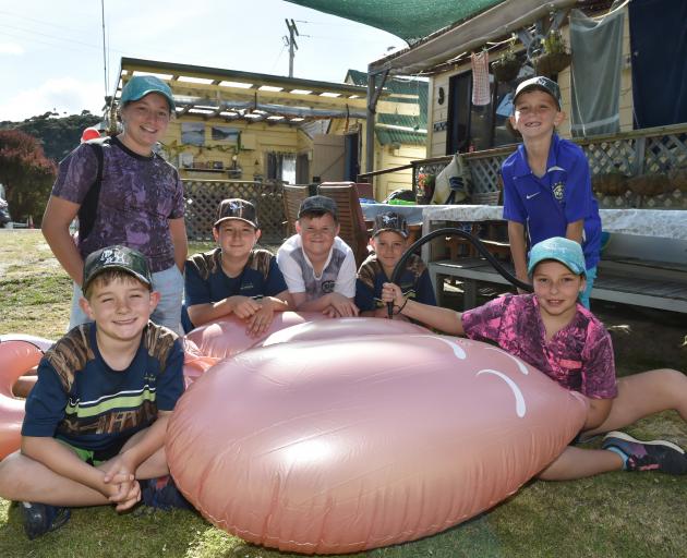 Pumping up the pink flamingo for an afternoon swim in the Taieri River at the Weatherall family crib at Taieri Mouth, are (from left) George Weatherall (7), Ella Weatherall (11), Flynn Weatherall (12), Beckham Sheridan (12), Archie Eaton (11), Thomas Weat