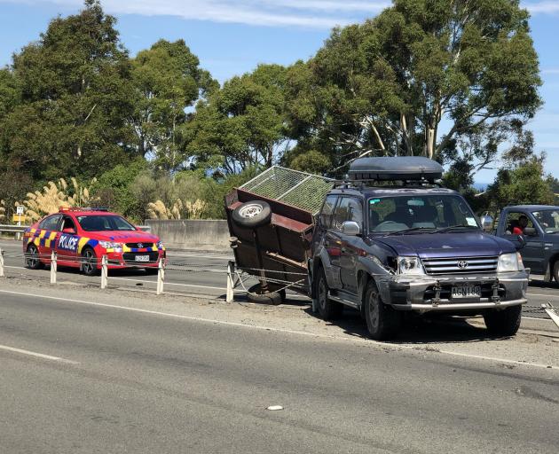 A truck collided with a 4WD before rolling off the Southern Motorway this afternoon. Photo: Supplied