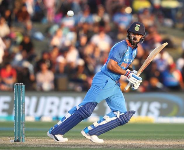 Virat Kohli bats for India against New Zealand last night at the Bay Oval. Photo: Getty Images