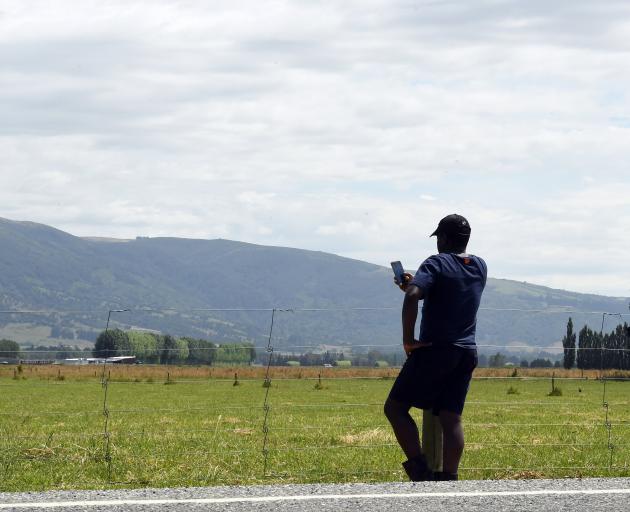 A Zimbabwean man now living in Dunedin is keeping a close eye on the downward spiral of violence...