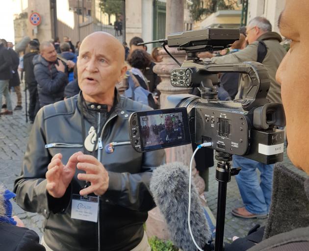 Dr Murray Heasley speaks to media while in Rome this week, during a major gathering of bishops called by Pope Francis to discuss the sexual abuse crisis engulfing the Catholic Church. Photo: Analyn Heasley