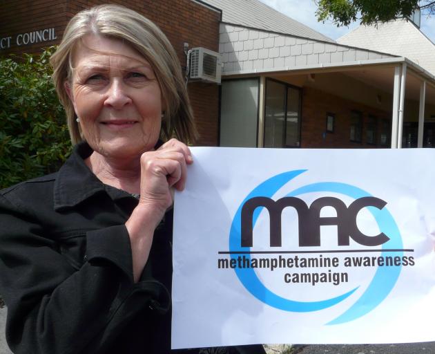 Clutha District Council community support and development adviser Jean Proctor shows off the new MAC Clutha Youth Council anti-meth campaign logo at council headquarters in Balclutha yesterday. Photo: Richard Davison