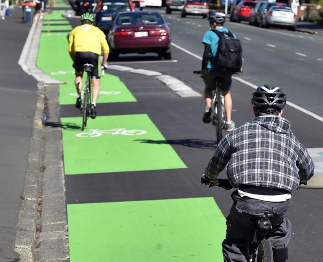 Cyclists use the new southbound cycleway on Cumberland St yesterday afternoon. PHOTO: PETER...