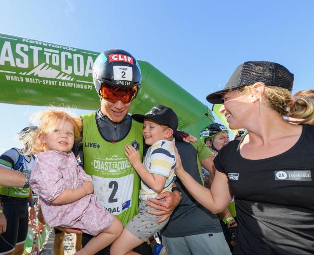Wanaka athlete Dougal Allan celebrates with his children Flynn (4) and Matilda (2) and wife Amy...