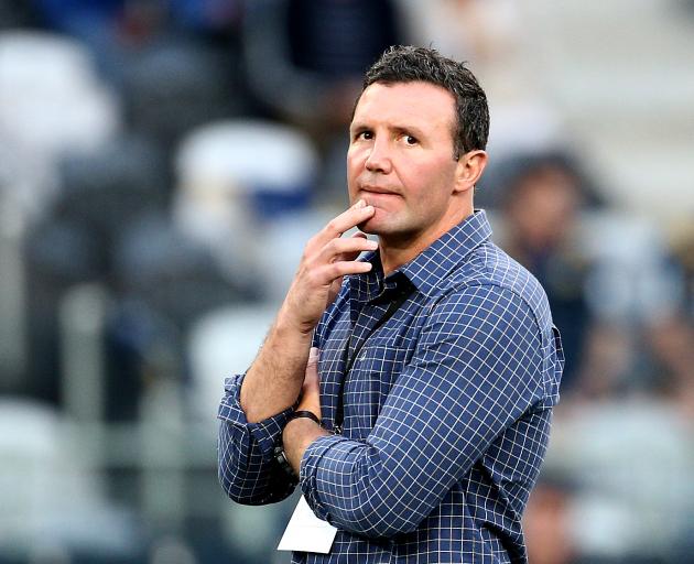 Highlanders coach Aaron Mauger looks on before the start of his side's Super Rugby match against...