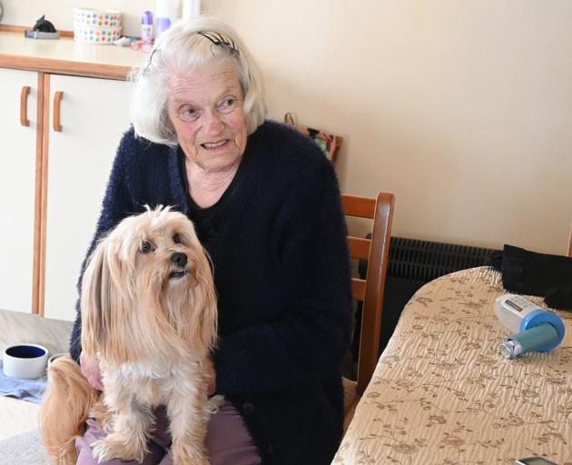Care at home means Gwen Robertson (75), with her dog Leroy, gets to stay longer in her flat while...